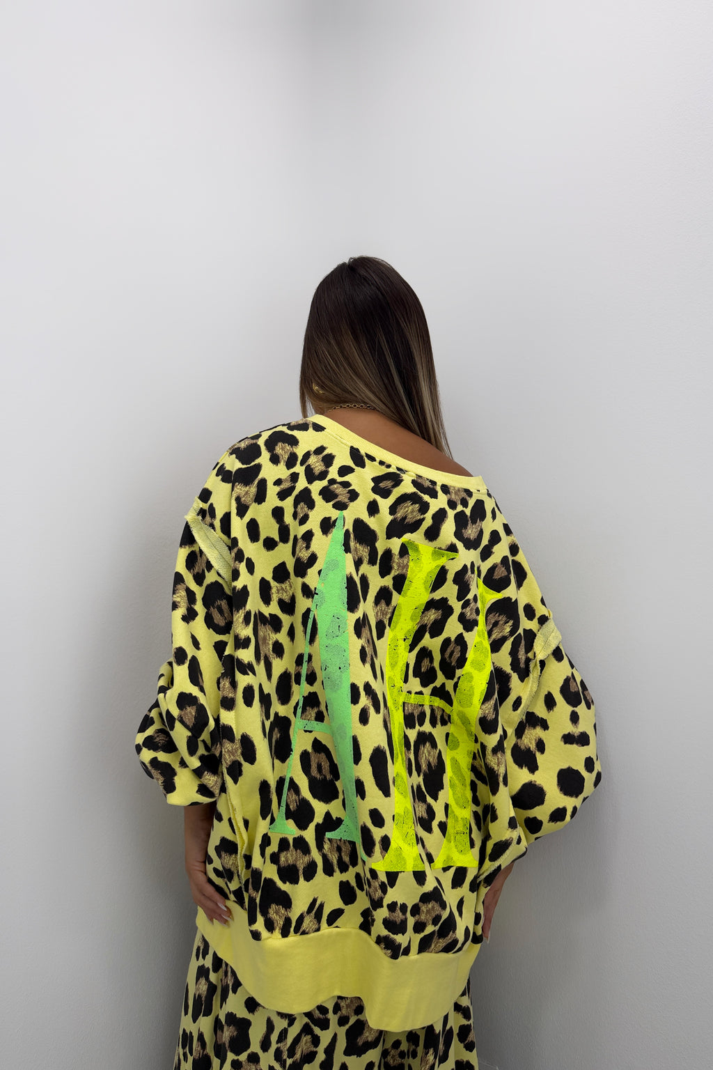 SUDADERA LEO FLÚOR