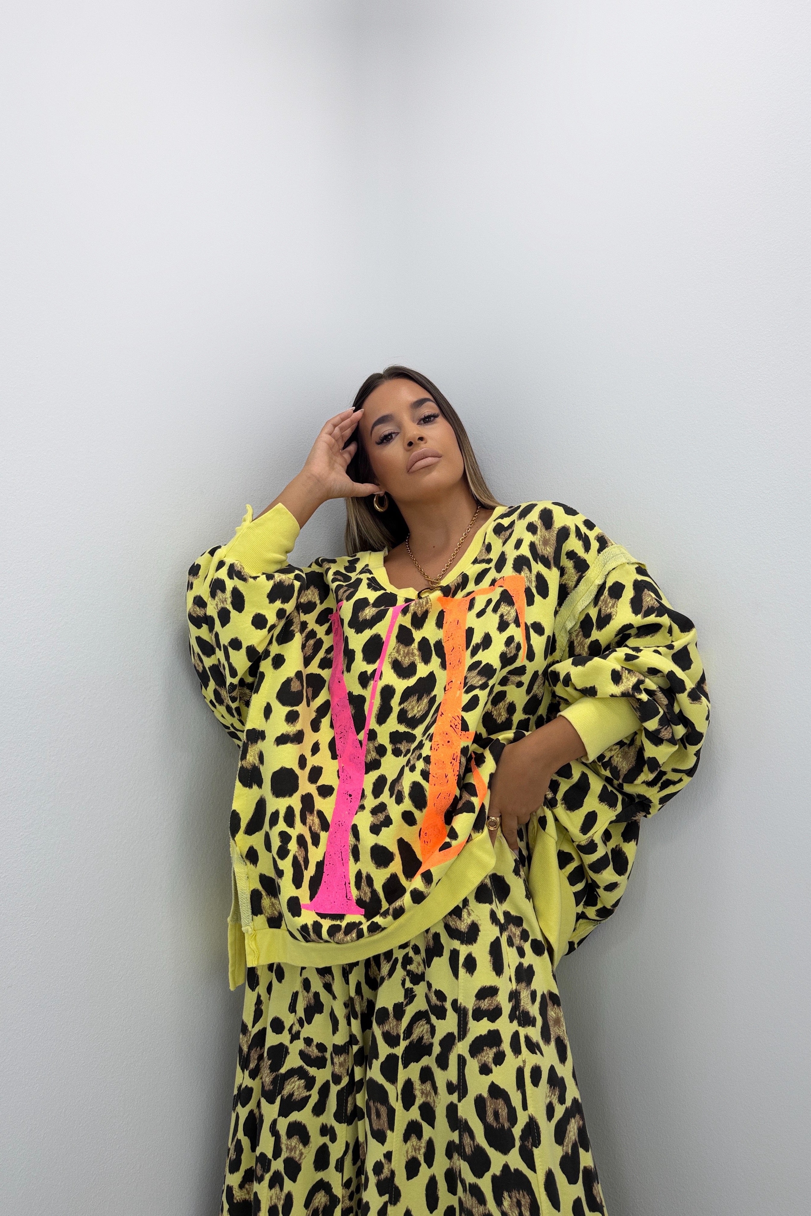 SUDADERA LEO FLÚOR