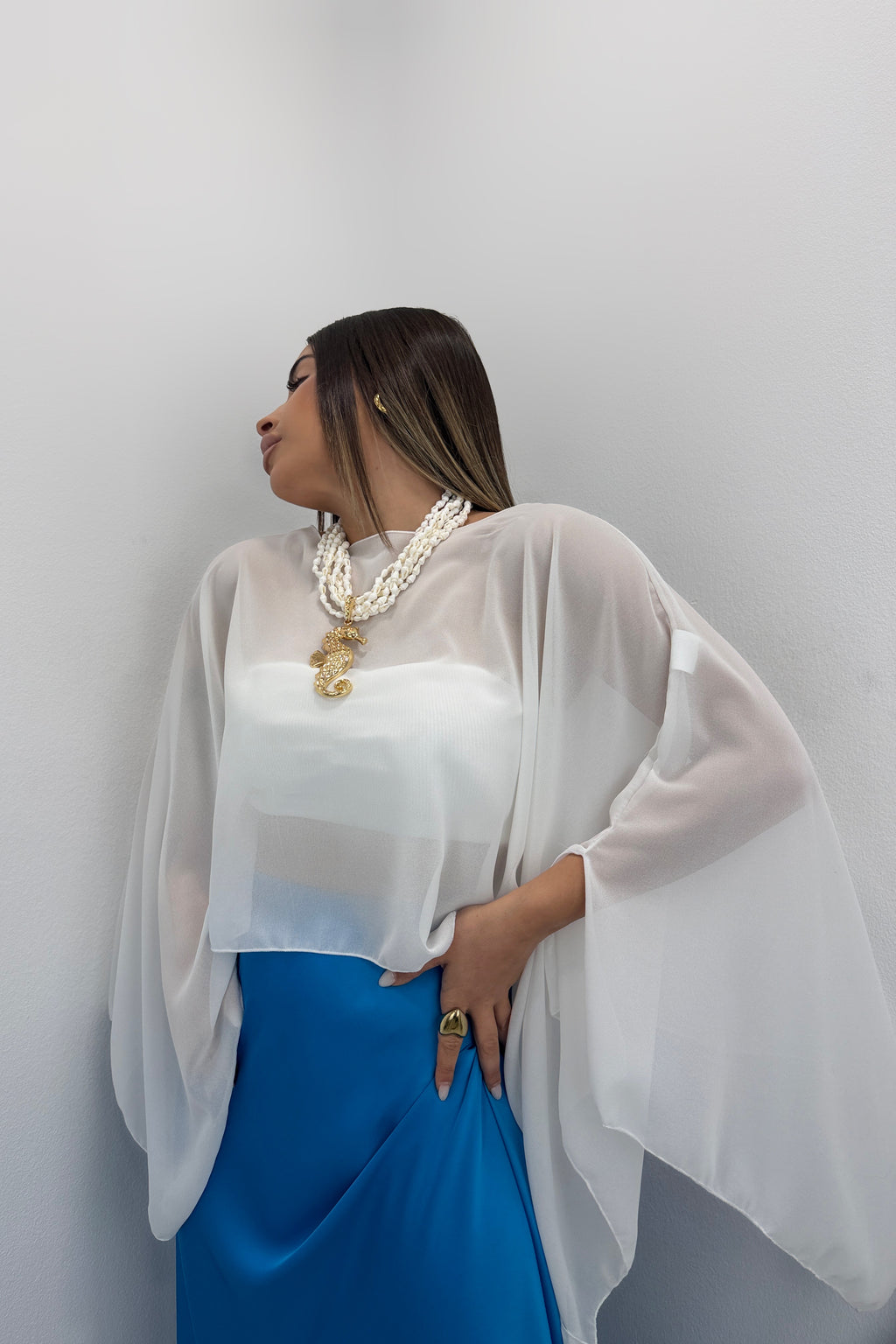 BLUSA CAPA